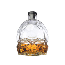 NUDE Memento Mori skull shaped whisky bottle filled front view