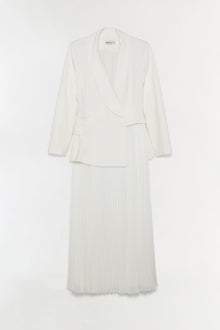 Cream-colored blazer dress with wrap top and pleated midi skirt on neutral background.