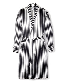The Petite Plume Mens Silk Long Robe in Black and White Bengal Stripe features long sleeves, a shawl collar, two front pockets, and a matching waist belt, evoking classic Hollywood glamour. Laid flat on a white background.