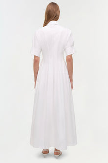 White cotton shirt dress with short sleeves and A-line skirt, shown from back on model.