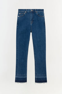 Blue straight-leg jeans with white button hardware and raw-edge cropped hems against white background.