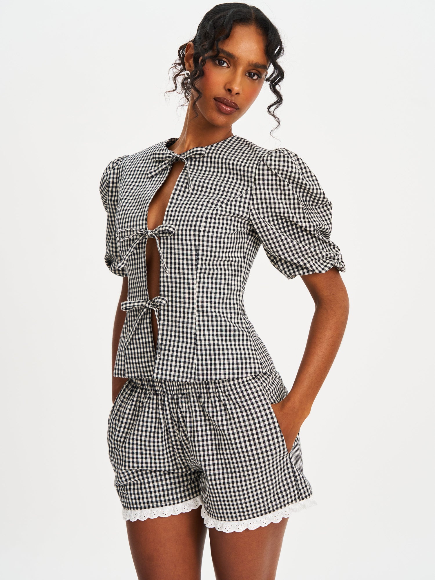 Qusayla Cotton Bubble Sleeve Bowtie Top | Black Gingham