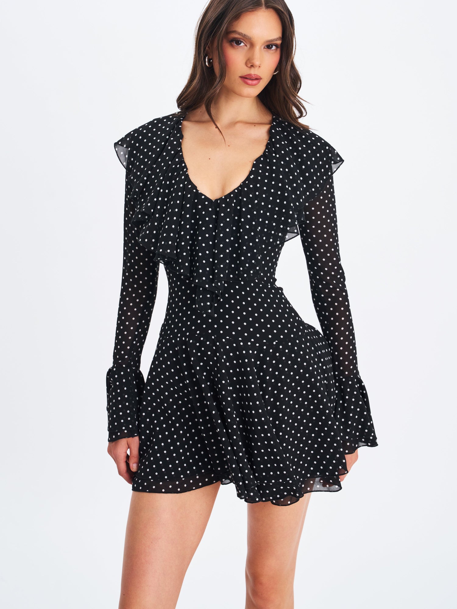 Omari Chiffon Polka Dot Ruffled Neckline Mini Dress | Black