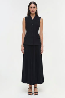 Black sleeveless button-front vest dress with pleated midi skirt and front pockets.