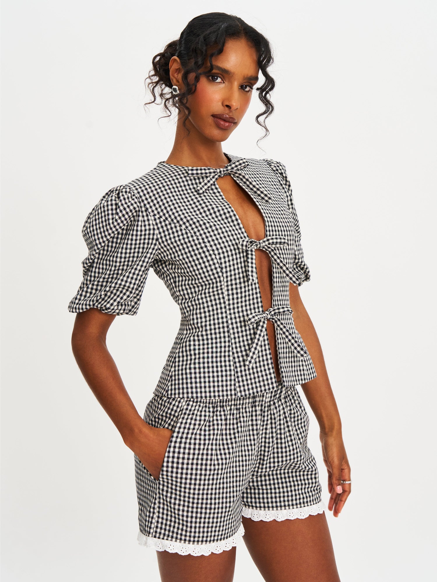 Qusayla Cotton Bubble Sleeve Bowtie Top | Black Gingham
