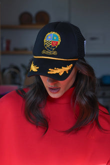 Herald Crest Trucker Hat | Black