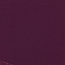 Fabric swatch for the LSPACE Stride Bra in plum, showing the plum color and fabric texture.