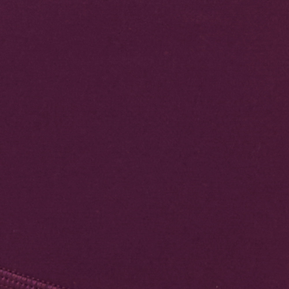 Fabric swatch for the LSPACE En Pointe Short in plum, showing the plum color and fabric texture.