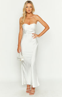 Front view of a white strapless satin maxi dress featuring a twisted detail on the bust