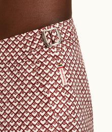 Bulldog Geo Print Mid-Length Swim Shorts | Copper Red/White Sand