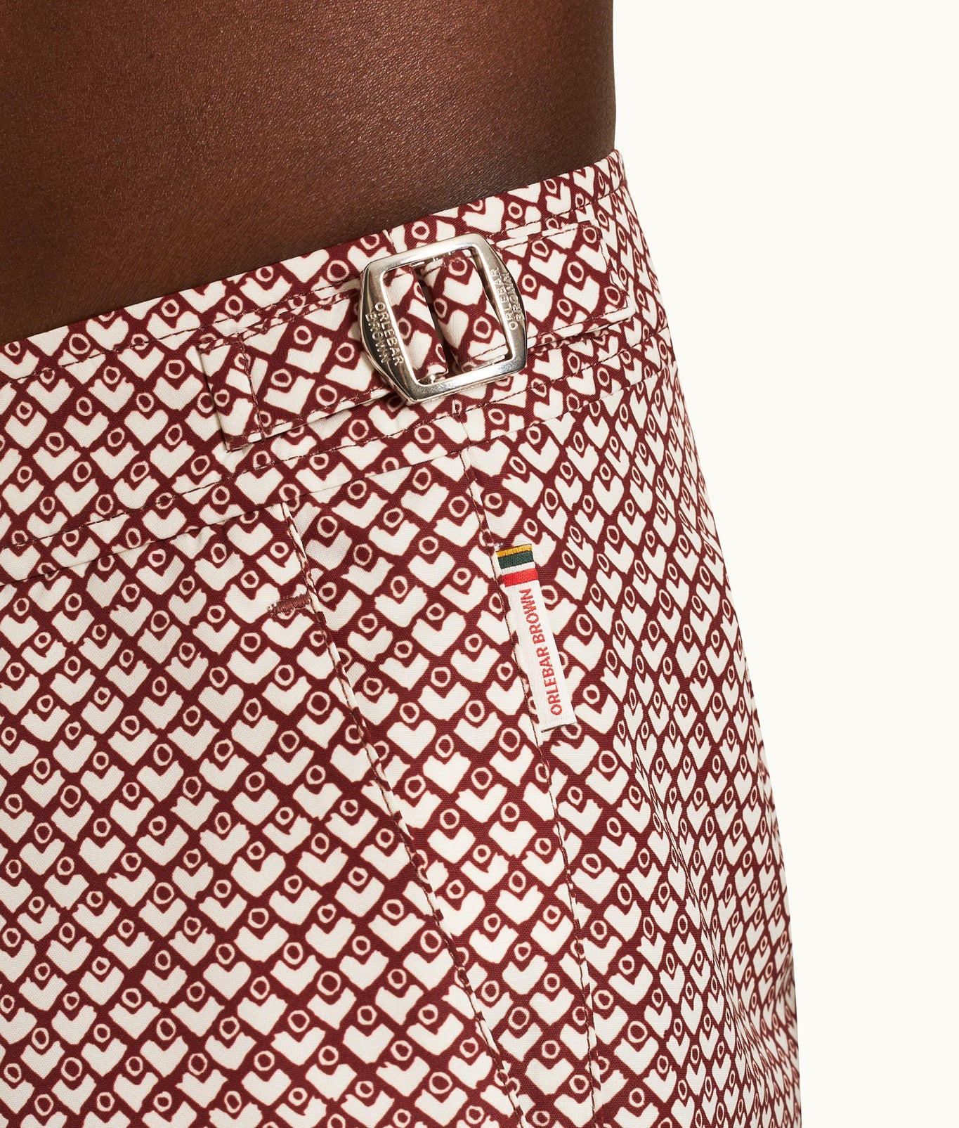 Bulldog Geo Print Mid-Length Swim Shorts | Copper Red/White Sand
