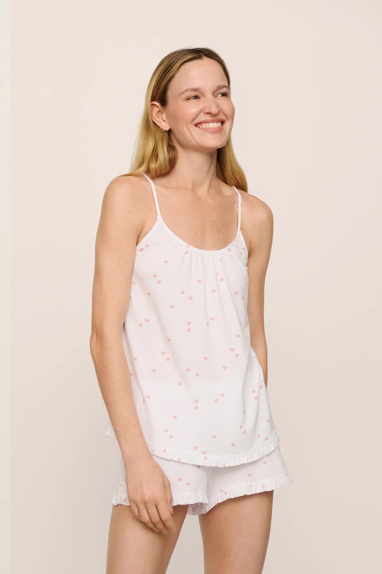 Model is wearing Gisele TENCEL Printed Modal Ruffle Cami & Shortie Short Set in SummerDaisyWhite