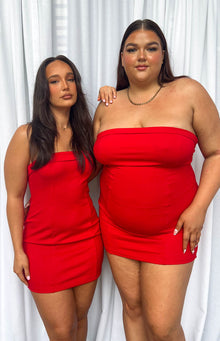 Red strapless mini dress with a straight neckline, showcasing its fitted silhouette on varying body shapes