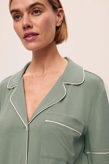 Model is wearing Gisele TENCEL Modal Short Sleeve & Pant PJ Set in Eucalyptus/Ivory