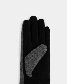 The OLGA - L425541 Grey by Rudsak is a women’s wool glove in black and gray, featuring a gray cuff and palm with black accents, shown on a light gray background.
