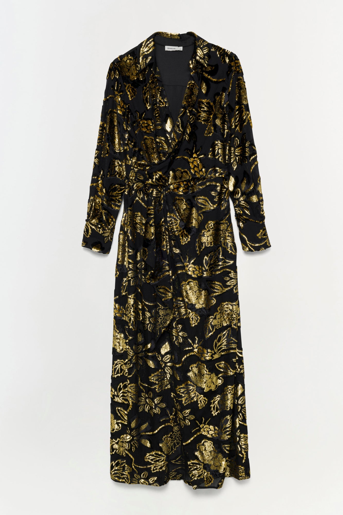 Black wrap gown with gold foil floral print, long sleeves, and floor-length skirt.