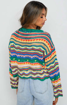Multi-coloured open knit sweater with horizontal stripes and varied crochet patterns