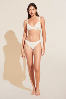 Model wears Soft Stretch Recycled Lace Triangle Bralette in Ivory.