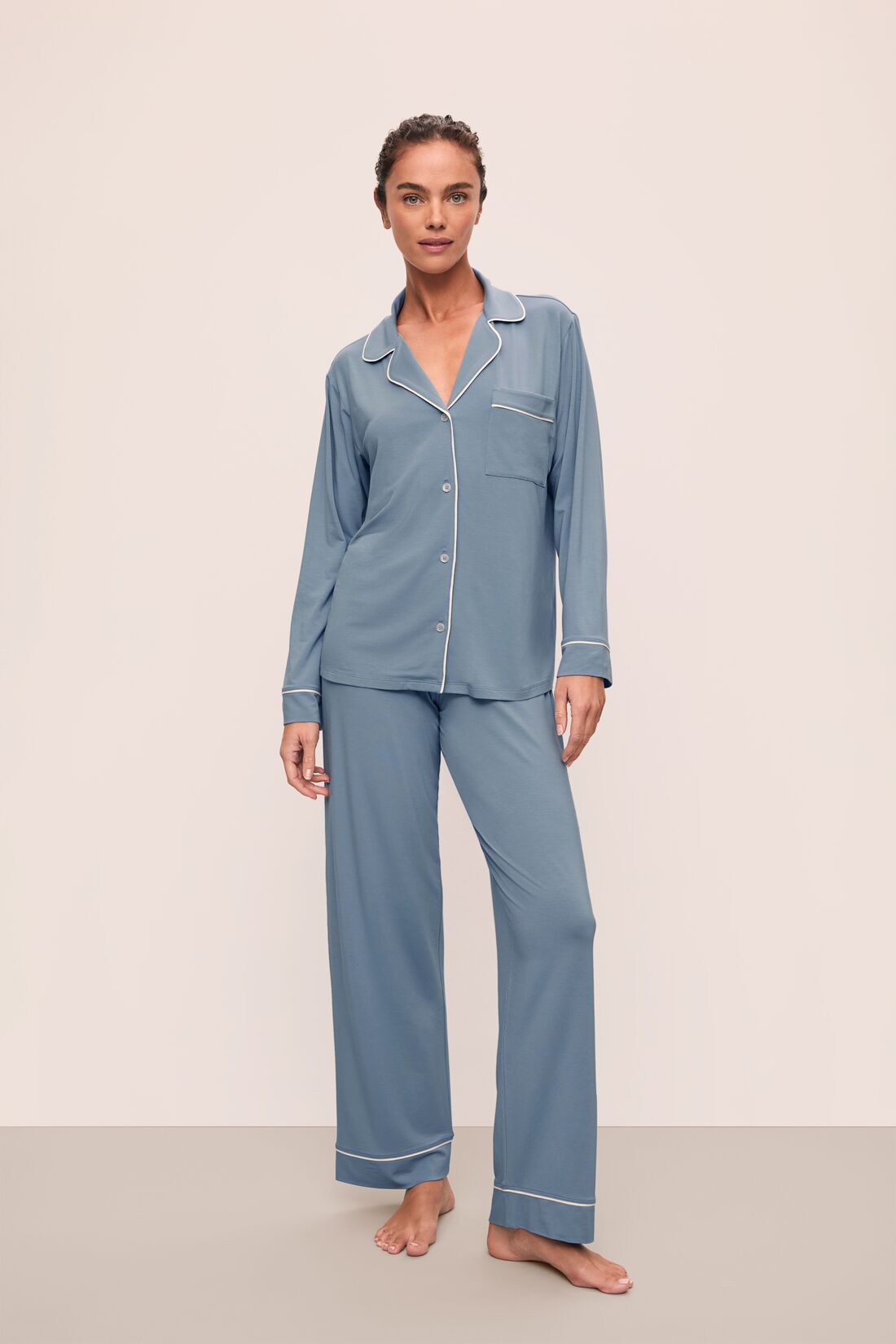 Model is wearing Gisele TENCEL Modal Long PJ Set in Faded Denim/Ivory
