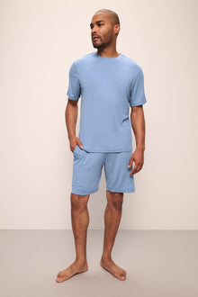 Model wears Henry TENCEL Modal Rib Short PJ Set in Wedgewood Blue.