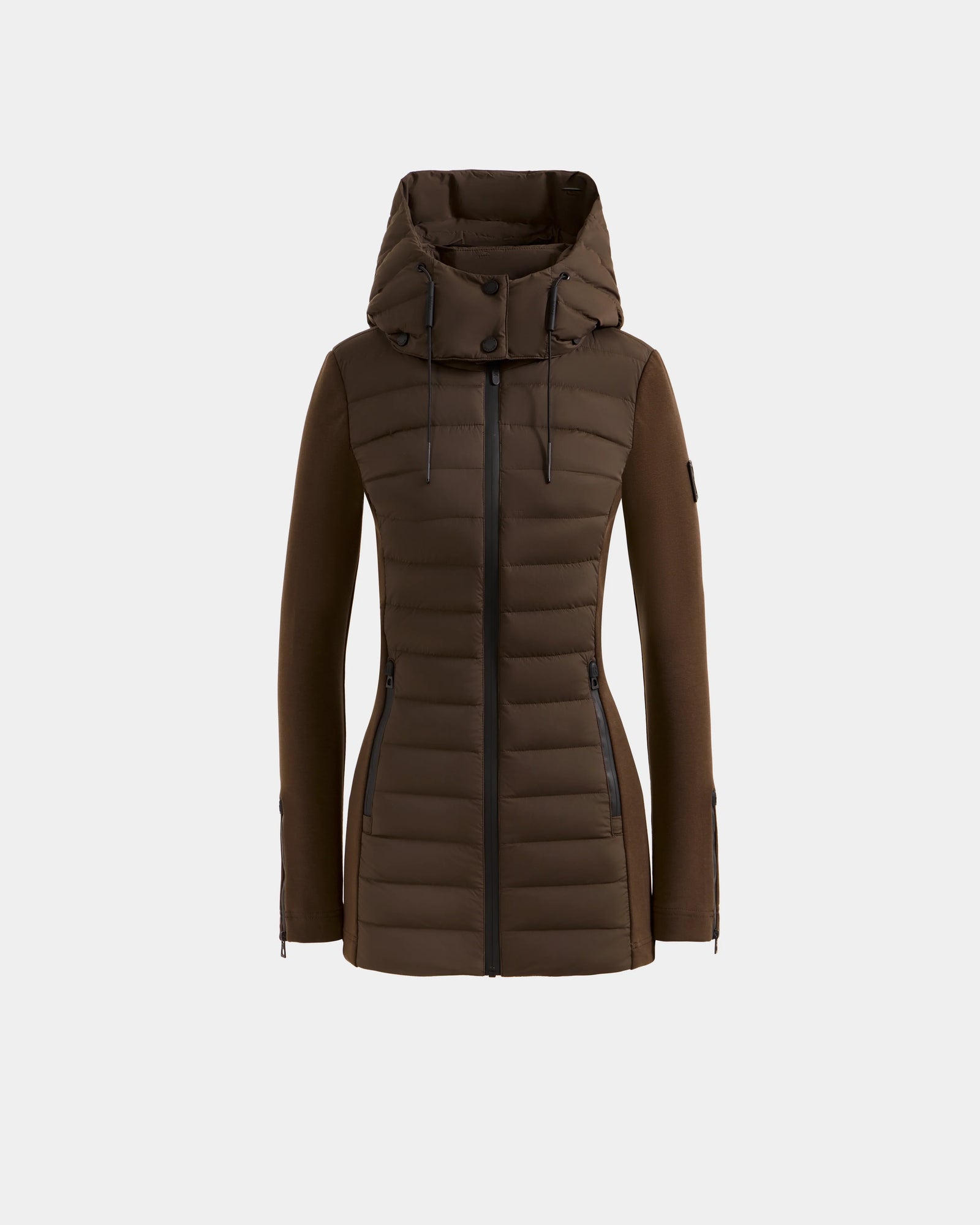 The Rudsak MARRY M - L125519 Espresso is a brown, knee-length women’s hybrid jacket with a fitted silhouette, removable hood, front zipper, quilted down-insulated body, and long sleeves, shown on a plain white background.