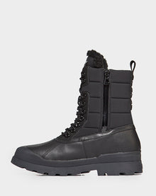 The Rudsak REAGAN - 6222500 BLACK is a men’s winter boot featuring cozy fur lining, offering warmth and style all season.