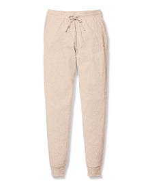 The Womens Pima Lounge Pants in Camel by Petite Plume are made from luxurious jersey knit, featuring an elastic waistband with a drawstring, side pockets, and cuffed ankles for comfort and style, shown on a white background.