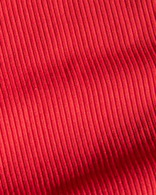 Close-up of bright pink ribbed fabric texture