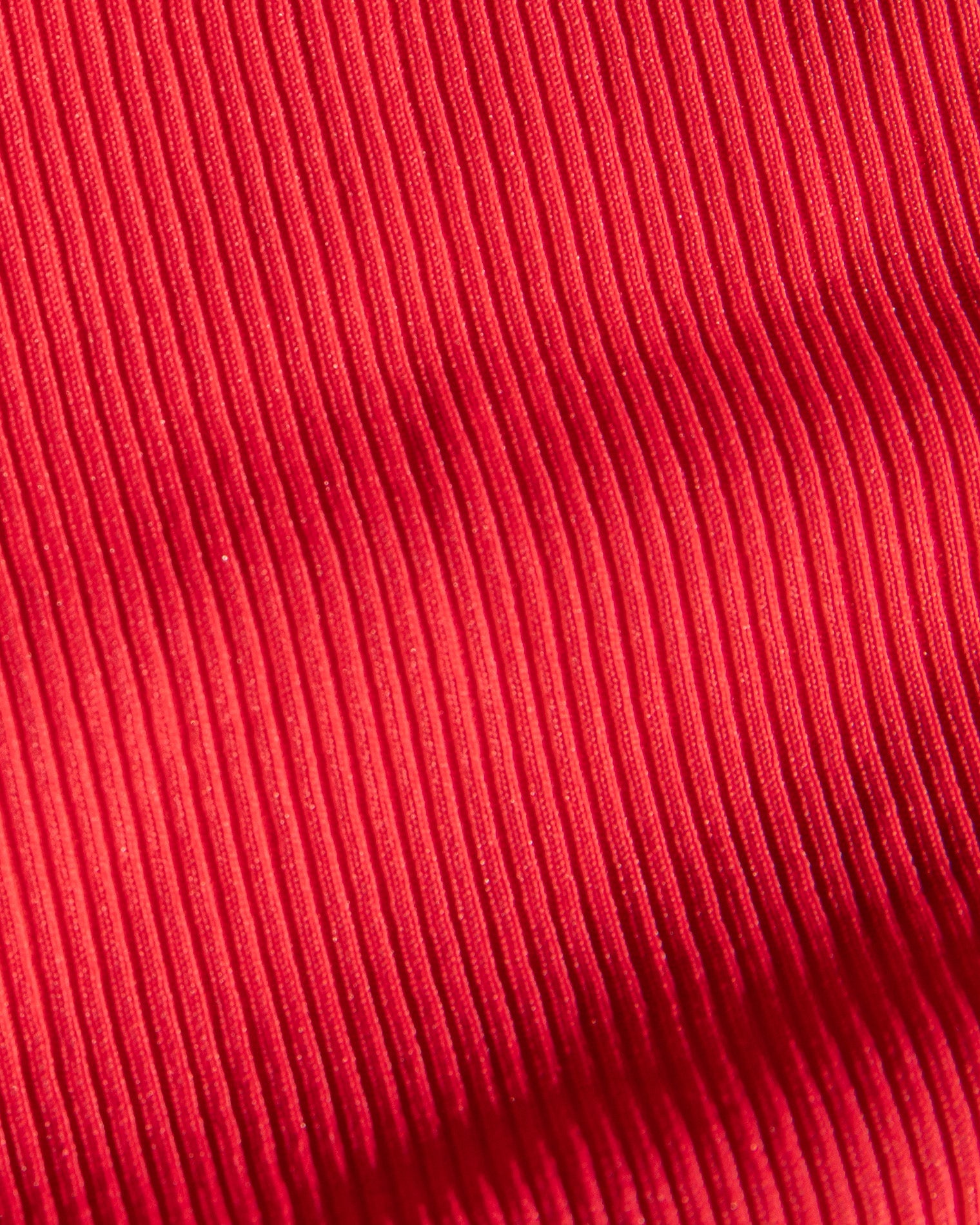 Close-up of bright pink ribbed fabric texture