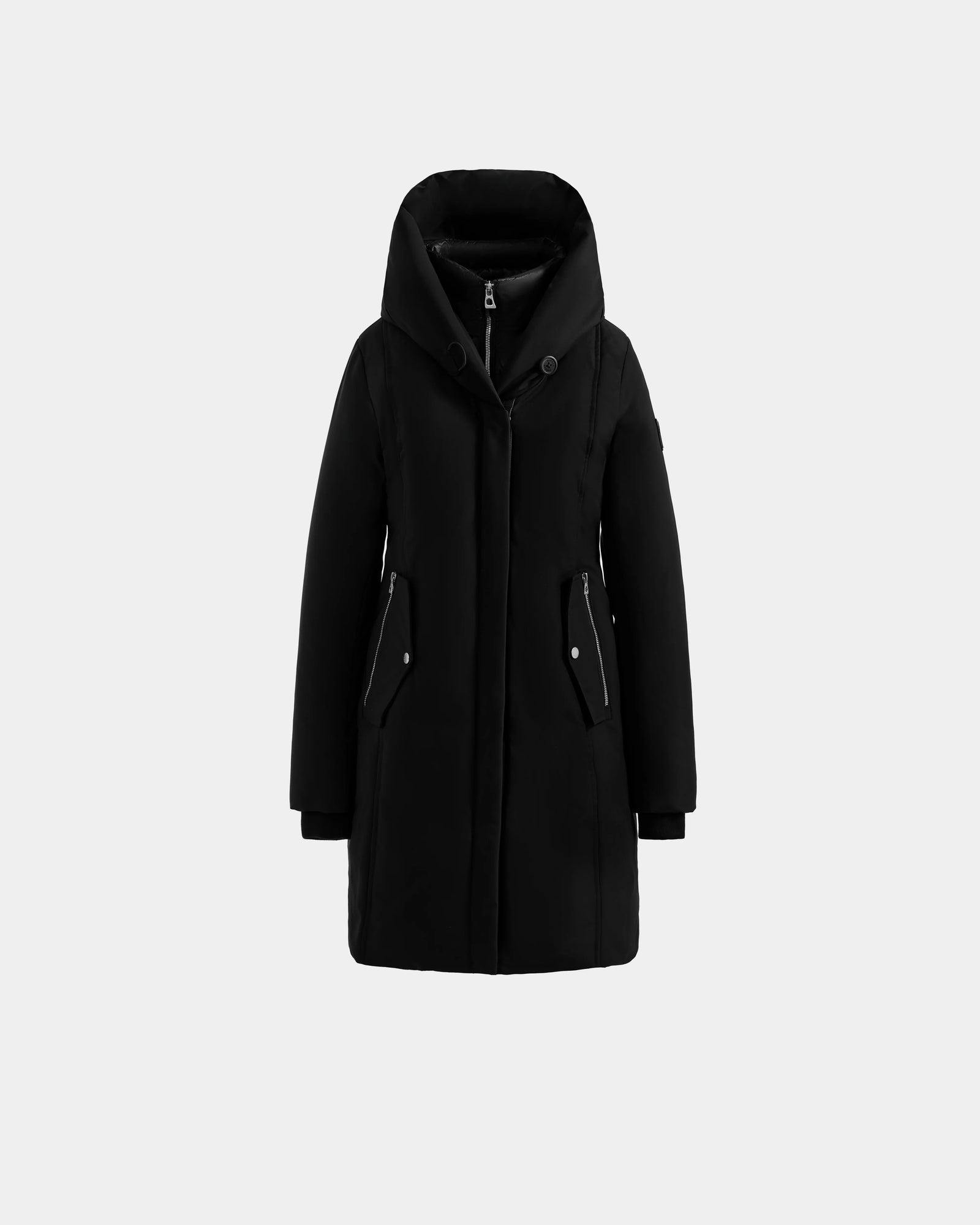 The Rudsak SARINA - L125550 Black women’s parka is knee-length with a hood, front zipper, snap buttons, two angled zippered side pockets, and RDS-certified down, shown against a plain light gray background.