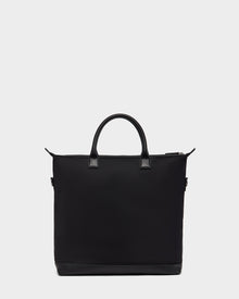 The DEXTER - 9324513 Black by Rudsak is a black canvas tote with two short handles and a zippered top, shown on a white background—a versatile accessory for any outing.