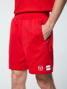 Man wearing red shorts.
