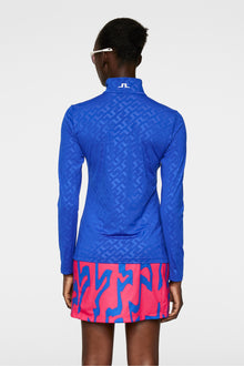 Women | Lauryn Deboss Mid Layer | Bias Bridge Blue