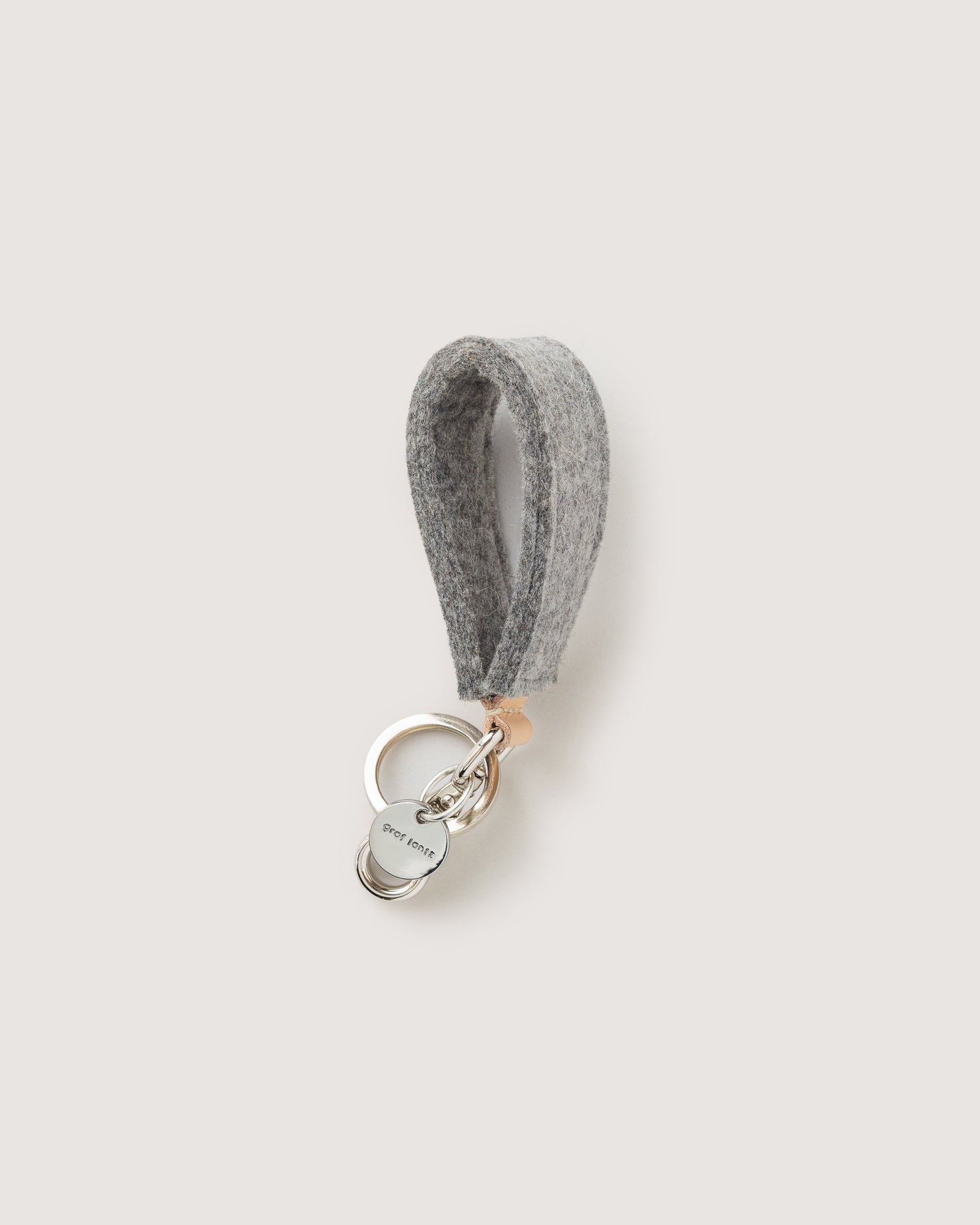 The Loop Fob is an elevated update to one of our most popular styles. Here in granite color